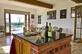 Pre dinner drinks and nibbles in the kitchen at High Cloud Farm Nr Raglan, Monmouthshire www.bhhl.co.uk